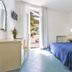 Terme Miramonte e Mare room in Casamicciola Terme with double bed and balcony door