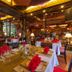 Royal Phawadee Village Patong restaurant with set dining tables and warm interior lighting