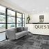 Quest Narre Warren lobby with reception desk, gray sofa and large windows in Narre Warren