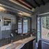 Villa Casagrande Resort E Spa bathroom with open window to garden view in Figline Valdarno