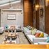 Charm Hotel Budapest lobby lounge with sofas, tables, and glass walls in Budapest