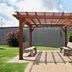 Red Roof PLUS+ Nashville South - Fairgrounds pergola with benches in landscaped courtyard