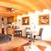 Hazienda Apartmenthotel in Gernsbach room with bed, dining table and kitchenette