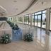 Park Hotel Mirabeau in Gasperina: long banquet setup in a bright room with floor-to-ceiling windows