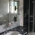 Hotel Engel im Salinental bathroom with shower, sink, mirror and window in Bad Kreuznach