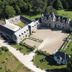 Aerial view of Chateau De Jallanges in Vouvray, showing a grand château and landscaped gardens