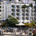 Emperador Vallarta Beachfront Hotel and Suites in Puerto Vallarta, beachfront hotel exterior with palm trees