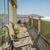 Mendocino Hotel and Garden Suites balcony with chairs and ocean view in Mendocino