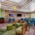 Fairfield Inn & Suites by Marriott Alamogordo lobby with seating area, TVs and dining tables