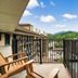 Balcony view at Gatlinburg Town Square in Gatlinburg overlooking mountains and the hotel courtyard
