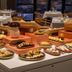 Montebelo Viseu Congress Hotel buffet table with assorted pastries, fruit, and breads in Viseu