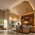 Red Roof Plus+ Vancouver Airport in Richmond lobby with curved reception desk and modern lighting