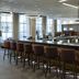 Courtyard by Marriott New Orleans Near the French Quarter bar with high stools and TV