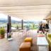 Hotel Valle de Cabezón terrace with seating and countryside views in Cabezón de la Sal