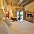 Hotel Abdij Dokkum in Dokkum room with double bed, dining table and kitchenette