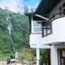 Ashley Resort in Nuwara Eliya with balcony views of a lush hillside and waterfall