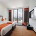 Hotel Himalaya Kathmandu guest room with twin beds and city-view balcony in Kathmandu