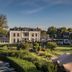 Landgoed Lauswolt in Beetsterzwaag with manicured gardens and a large event tent on the lawn