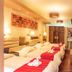 Hotel Royal Qosqo in Cusco: twin beds with red runners in a warm guest room