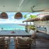 Batu Karang Lembongan Resort & Spa in Nusa Penida with oceanview deck and thatched gazebo seating