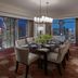 Mandarin Oriental, Kuala Lumpur dining room with city skyline views and large windows