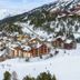 Snowy ski village at Pierre & Vacances Premium Arc 1950 Le Village in Bourg-Saint-Maurice with mountain views