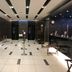 Dormy Inn Hakata Gion lobby in Fukuoka with tiled floor, elevator banks and front desk seating
