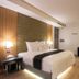 168 Motel-Hsinchu guest room in Hsinchu City with king bed, desk, and modern lighting