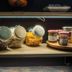 Logis -Hotel & Restaurant De La Place in Seulline, jars of granola and jam on a breakfast shelf