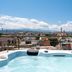 Boutique Hotel Fortino in Chania rooftop hot tub with city and mountain views