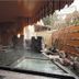 Motoyu No Yado Kurodaya in Beppu, covered hot spring bath with stone pool and outdoor view