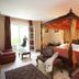 Hostellerie Les Hauts De Sainte Maure room with four-poster bed and balcony in Sainte-Maure-de-Touraine