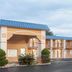 Super 8 by Wyndham Port Royal/Beaufort in Port Royal, exterior of a low-rise motel with blue roof