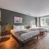 Hébergement Mont-Ste-Anne Condos room in Beaupre with two beds, kitchenette, and large window