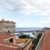 Hotel San Francisco in Dorgali with sea view over red-tiled rooftops