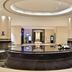 Parkyard Hotel Jiaxing lobby with circular reception desk and modern ceiling lights in Jiaxing