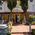 Hotel Villa Ruzica in Crikvenica exterior with courtyard dining terrace and entrance