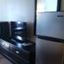 Super 8 by Wyndham Estherville room with TV, mini fridge, desk and chair