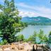 The Lodge on Lake Lure in Lake Lure with a scenic lake and mountain view from the terrace