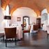 Hotel Zamek Lubliniec in Lubliniec restaurant with arched brick ceiling and set tables