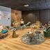 Lobby lounge at Hôtel Mercure La Roche Sur Yon Centre in La Roche-sur-Yon with colorful chairs and round tables