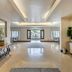 Omni Rancho Las Palmas Resort & Spa lobby with arched entryway, tiled floor, mirrors and console tables in Rancho Mirage