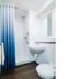 Travelodge Dartford bathroom with shower, sink and toilet