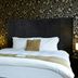 Chequers Inn by Greene King Inns in Uckfield bedroom with large bed and patterned wallpaper