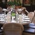 Hotel du Vin Brighton in Brighton: outdoor wicker dining table set with wine glasses and cushions