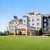 Fairfield Inn & Suites by Marriott Paducah exterior with green lawn and clear blue sky in Paducah