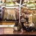 Shianghu Boutique Hotel in Chiayi City lobby decor with floral centerpiece and decorative bird figurines