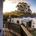Bella Manga Country Escape in Plettenberg Bay with cottage-style rooms and a sunset view from the deck