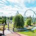 Power Park Accommodation in Kauhava, landscaped garden with roller coaster views and a small stream