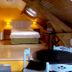 Logis Hôtel Restaurant Auberge Saint Martin room in Saint-Gatien-des-Bois with sloped wood ceiling and bed